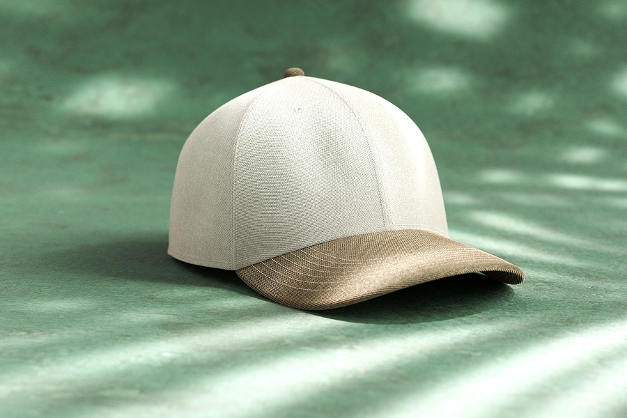 White and brown cap on green background.